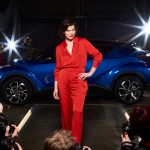 LONDON, ENGLAND - FEBRUARY 02:  Milla Jovovich, actress and model, is captured stepping out of the new Toyota C-HR onto a catwalk at the world痴 first drive through immersive theatre experience on February 2, 2017 in London, England. 禅he Night that Flows� saw 100 guests experience the immersive event, which brought to life the different features of the new Toyota C-HR.  (Photo by Gareth Cattermole/Getty Images for Toyota) *** Local Caption *** Milla Jovovich